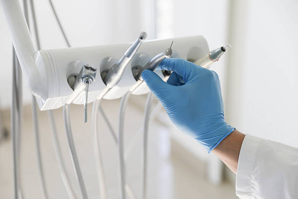 Professional Tooth Extraction technician working in Jacksonville, FL
